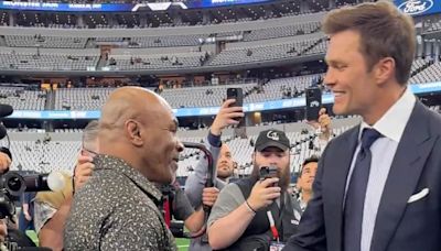 Tom Brady hugs Mike Tyson before Cowboys-Saints game at AT&T Stadium