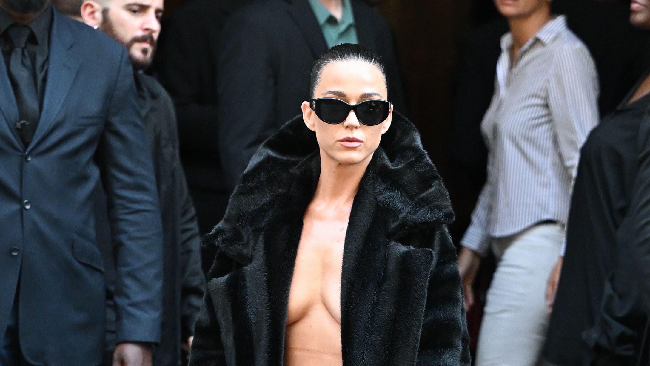 Katy Perry Goes Dares to Go Topless Under an Open Coat at Balenciaga’s Couture Show