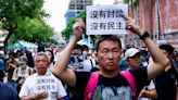 Protests as Taiwan parliament pushes contentious reforms