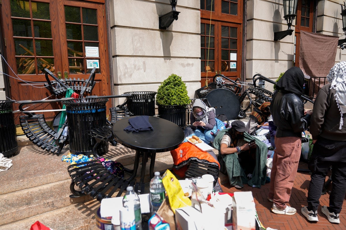 Columbia chaos escalates as pro-Gaza protesters seize campus hall and college threatens expulsions