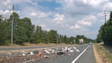 Garbage truck leaves trail of trash on Fairfax County road