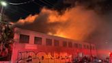 'Building will be a total loss': 70 firefighters battle Oakland warehouse fire