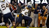 Daniels, defense lead West Virginia past Virginia Tech 33-10