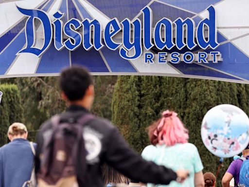 Americans are shopping less but they’re still spending on flights, hotels and Disneyland