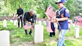 Former President Obama surprises volunteers at Memorial Day event