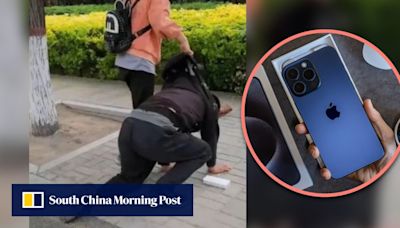 China father kneels on street after daughter shamed him for not buying her an iPhone