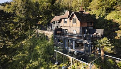 This $3.2 Million Home in the U.K. Was Built Into a Rainforest Overlooking the Coast