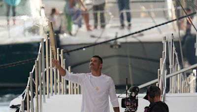 Torchbearers in Marseille kick off the Olympic flame's journey across France