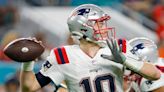 Patriots-Panthers Live: Mac Jones has a photo of the Patriots playoff loss in his locker