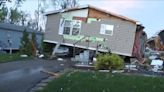 Portage couple leaves to take shelter just before tornado rips home from foundation, throws it onto car