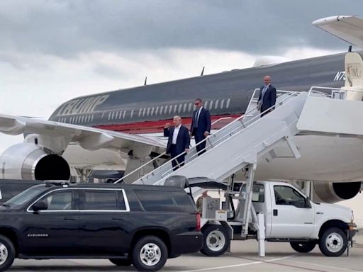 Trump arrives in Milwaukee after assassination attempt as FBI races to establish shooter’s motive: Live