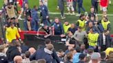 West Ham players brawl as AZ Alkmaar supporters attack - and one Hammers fan keeps dozens at bay