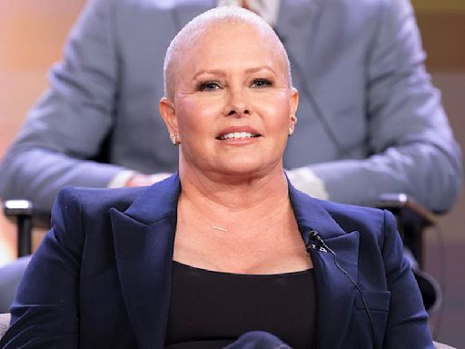 Nicole Eggert reveals her shaved head after breast cancer diagnosis