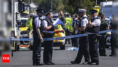 Police clash with a violent crowd gathered near the site of UK stabbing attack that killed 3 girls - Times of India