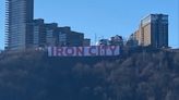 Iron City billboard returns to Mount Washington with new look
