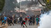 Police in Kenya open fire amid protests against new taxes. At least 2 are killed and 26 wounded