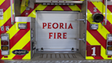 Fire destroys structure, garage in South Peoria