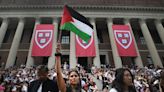 Hundreds walk out of Harvard commencement after 13 pro-Palestine protestors barred from graduating