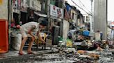 'Back to zero': Manila flood victims clean up, start again