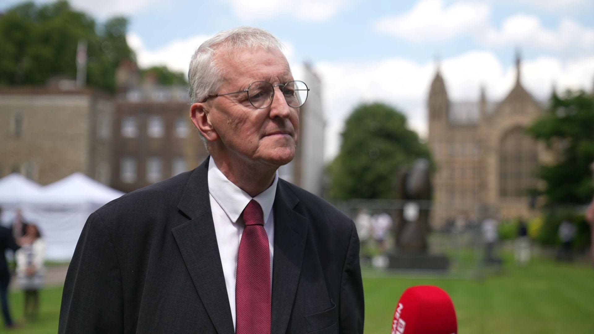 Benn will not put timeline on repeal of Troubles act