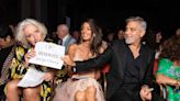 Emma Thompson Chews on George Clooney's 'Reserved' Seat Sign Next to Amal in Hilarious Venice Photo