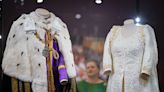 See King Charles and Queen Camilla's Coronation Outfits Up Close in New Buckingham Palace Display