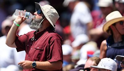 Omaha workers, CWS fans battle 'hairdryer' heat that 'feels like 1,000 degrees'