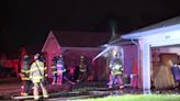 Crews battle Moore house fire during overnight storms