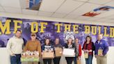 Carroll Business Association give gift bags to teachers, help with community clean up