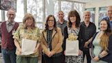 Ann Chiarini, teacher of the year, and Gail Purdy, classified employee of the year, honored by school district