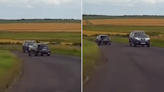 Shocking moment swerving driver cheats death on NC500 in heart-stopping clip