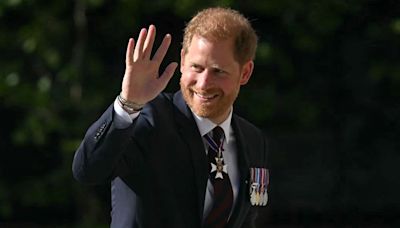 Prince Harry steps out solo in London while King Charles III attends Buckingham Palace garden party