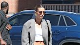 Hailey Bieber Grunged Up a Classic '80s Workwear Look With Low-Rise, Zip-Up Pants