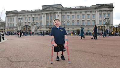 Queen Camilla hosts boy who missed garden party