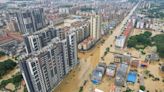 China evacuates over 100,000 as heavy rain continues to lash south