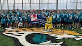 ‘I enjoy being here’: More than 60 Special Olympics Florida athletes sign 1-day contracts with the Jaguars