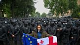 Protesters throng streets of Georgia's capital after parliament passes so-called 'Russian law'