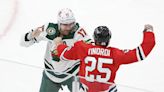 Blackhawks' Nick Foligno reacts to heavyweight fight between brother Marcus Foligno and Jarred Tinordi
