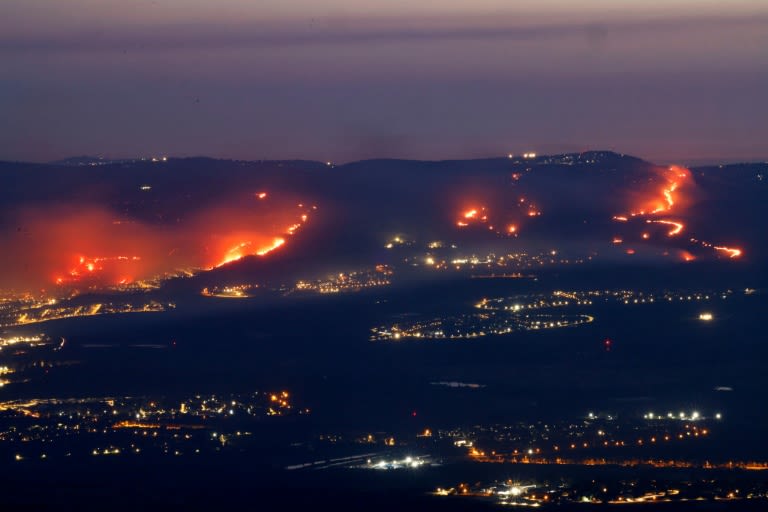 Forest fires blaze in north Israel after rockets launched from Lebanon