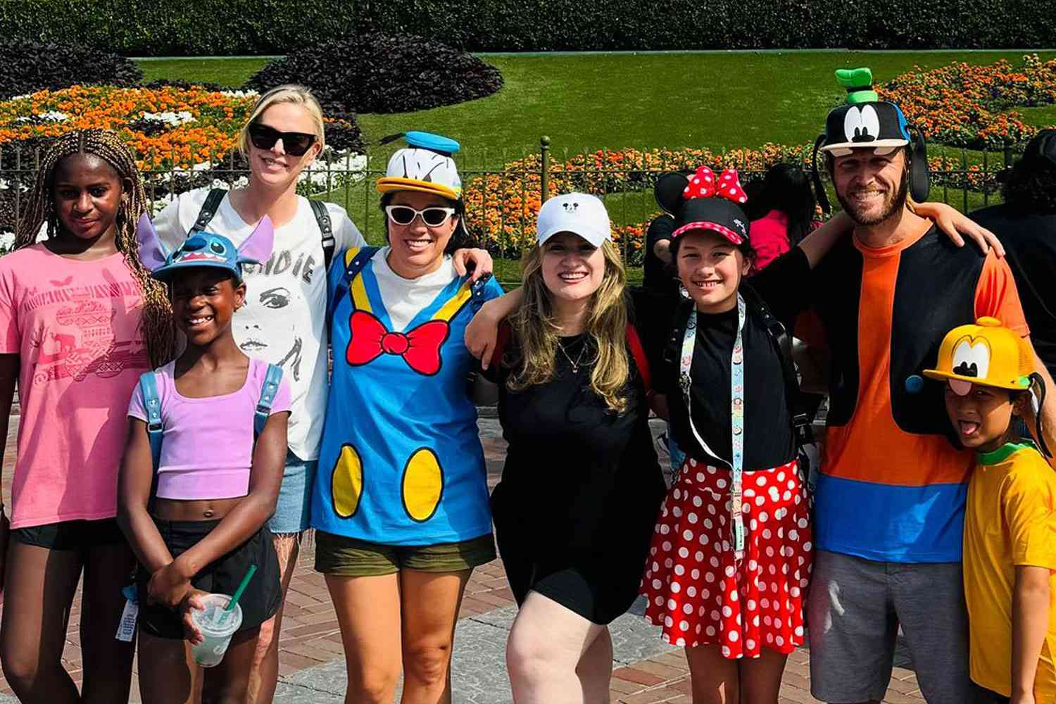 Charlize Theron Kicks Off 'Spooky Season' with Her 2 Daughters on a Trip to Disneyland