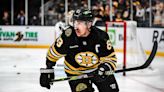 Latest updates on Bruins captain Brad Marchand's upper body injury