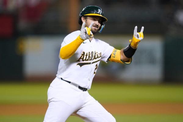 A's hit double digits again, rout Angels 13-3