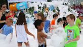 Bit of bubbly on a warm day? Olathe library draws Kansas City-area kids with foam fun