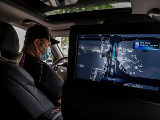Shanghai to put driverless robotaxis on roads despite pushback from taxi drivers in Wuhan