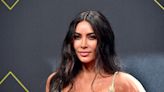 Kim Kardashian Puts Fans in a Trance With Snake Dance in Burgundy Bikini
