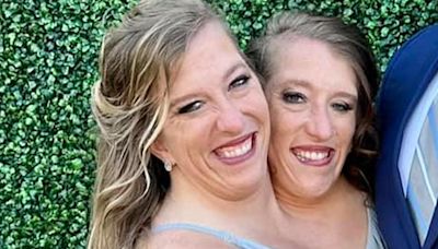 Conjoined twin Abby Hensel confirms marriage after pictures show smiling bride