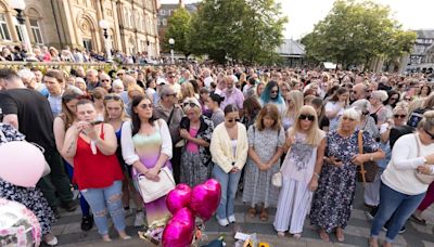 Tributes paid to girls who died in Southport attack as hundreds attend vigil