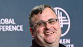 LinkedIn co-founder Reid Hoffman says he is 'beating the positive drum very loudly' for AI as other tech execs express concerns