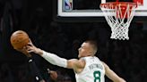 How should the Celtics re-integrate Porzingis after his injury?