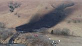 Kansas residents hold their nose as crews mop up massive U.S. oil spill